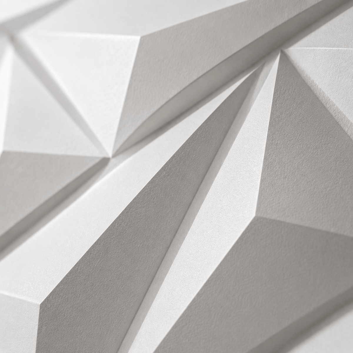 Panneau mural 3D blanc mat avec motif géométrique facetté